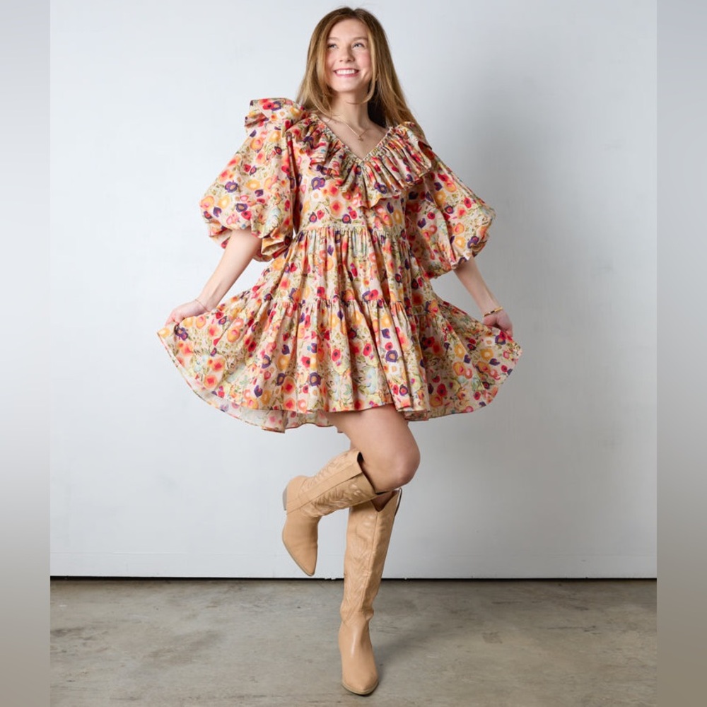 Vestique Pascal dress in orange floral. Size medium.